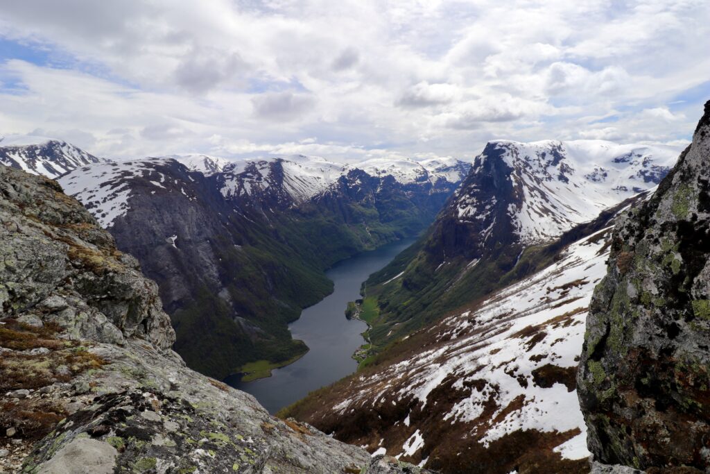 View over Naeroyfjord from Breiskrednosi Summit | © Travels and Wandering