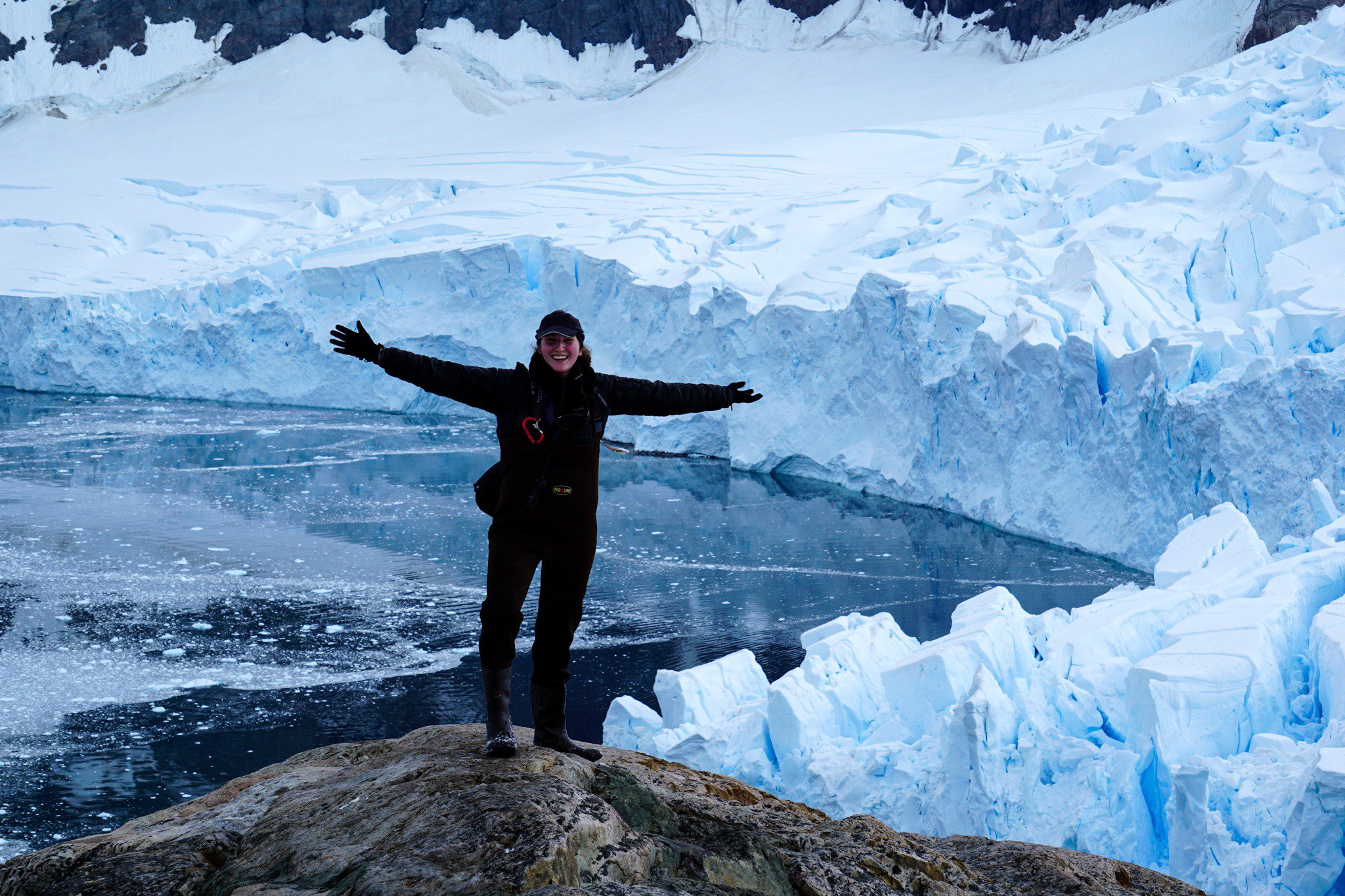 Alexandra in front of Neko Harbour, Antarctica adventure travel photographer and antarctic ambassador